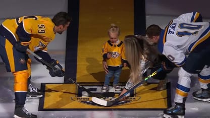 Predators young fan puck drop hockey fights cancer