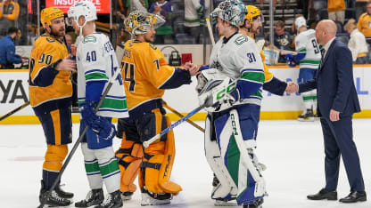 Canucks, Preds shake hands